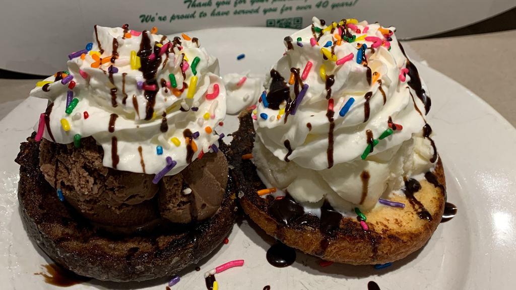 Donut Sundae · Warm chocolate and cake donuts with ice cream and whipped cream.