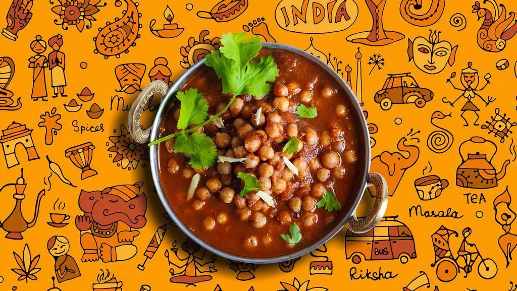 Chickpea Classic · Whole chickpeas, slow cooked in an onion and tomato curry with Indian whole spices, served with a side of our aromatic basmati rice