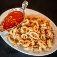 Crispy Fried Calamari · Lightly fried to a golden brown in our one of a kind seasoned flour. Served with mild or hot...