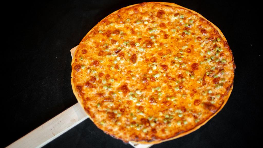 Vodka Sauce Pizza Large · Frank's famous pink vodka sauce with prosciutto and peas, topped with mozzarella cheese.