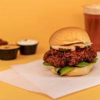 Korean Spicy Chicken Sandwich · Sweet and spicy savory glazed fried chicken topped with lettuce, pickles, and our signature ...