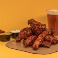 The Burger Co. Chicken Wings · Crispy and crunchy fried chicken wings painted with your favorite sauce.