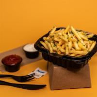 Truffle Fries · Crispy hand cut fries with sea salt and white truffle essence.