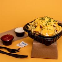 Cheese Fries · Crispy hand cut fries with our homemade cheese sauce.