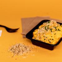 Truffle Mac & Cheese · Macaroni prepared with a housemade cheese sauce, bread crumbs and white truffle.