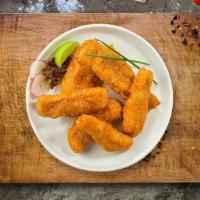 Bully Buffalo Tenders · Chicken tenders breaded and fried until golden brown before being tossed in buffalo sauce.