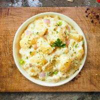 Mashy Mashy Potato · Mashed Idaho potatoes cooked, seasoned with garlic, butter, and topped with crispy bits of b...