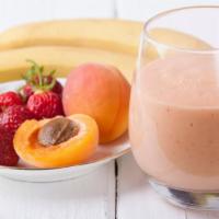 Bee Peachy Smoothie · Fresh smoothie made with peaches, mango, strawberries, honey and coconut water.