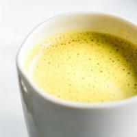 Golden Milk Latte · 6 oz. of Dona turmeric concentrate with ginger, pink peppercorn, allspice, and lemongrass, w...