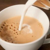 Café Au Lait · Seasonal drip coffee with steamed milk.