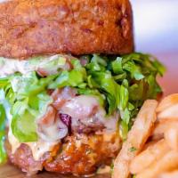 Cairo'S Burger · Angus beef, lettuces, tomatoes, mozzarella cheese in a fried green plantains bun that's been...