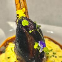 Braised Lamb Shank · 4 hour braised lamb shank served with a creamy cassava purée paired with a red wine reductio...