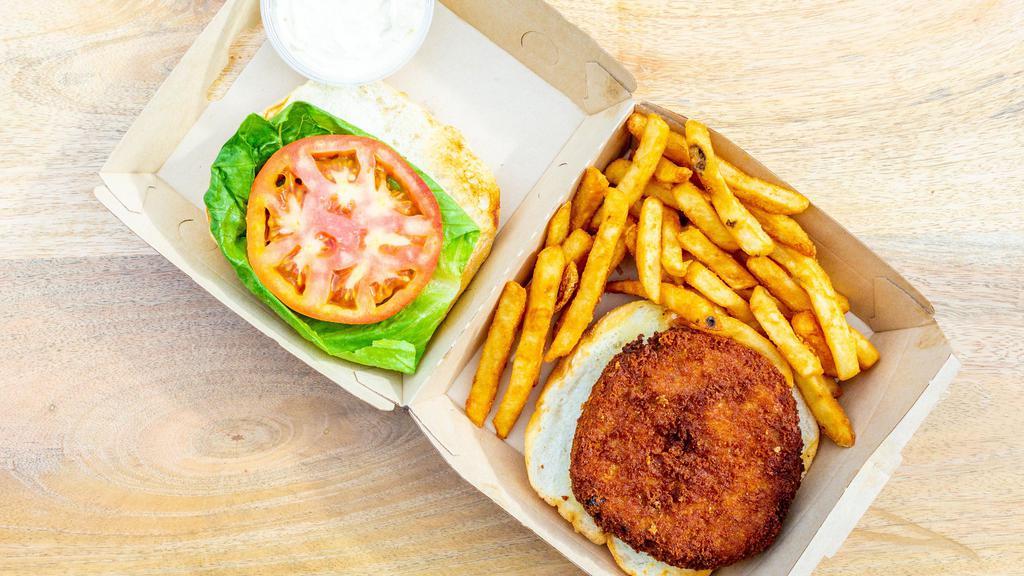 Crab Cake Sandwich · (Tartar Sauce )  served on kaiser roll lettuce & sauce and 
you can apply tomato or onion. 
Includes fries or any side options Spriez, onion ring, 8 oz coleslaw  add $1  one vegetables