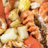 Harbour House Special · Whole lobster, snow crab legs and shrimp.
 Served with comes with potatoes corn & Cajun  sauce