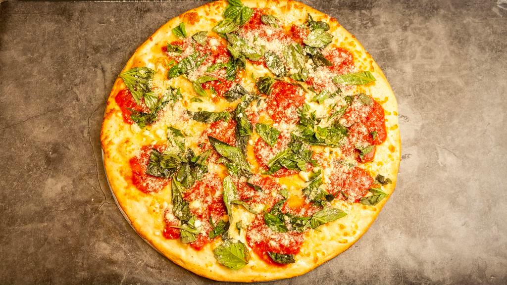 Champion Margherita Pizza · Mozzarella, our secret sauce, basil, pecorino Romano, mushrooms, and Parmigiano Reggiano.