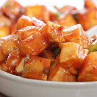 Paneer Chilli · Vegan, Gluten-Free. (cooked with bell pepper, sweet & chili sauce)