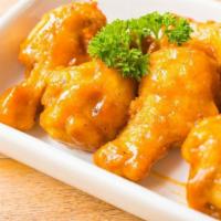 Buffalo Chicken Wings · (Blue cheese sauce)