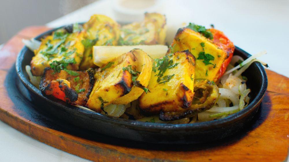Nawabi Paneer Tikka · Gluten-free, vegan. (cottage cheese, bell peppers and spices cooked in clay oven)