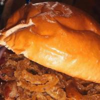 Cowboy Burger · Bacon, BBQ sauce fried onions and choice of cheese (suggested cheese;  Cheddar cheese)
Our b...