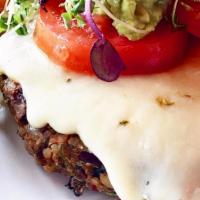 Veggie Burger · Made from red and black beans, brown rice, peppers, oatmeal and egg whites. Topped with guac...
