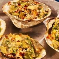 Baked Clams · Baked clams topped with bread crumbs & oregano.