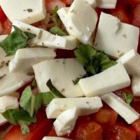 Christina Slice · Thin Square Slice with Light Tomato Sauce, Freshly Diced Tomatoes, and Fresh Mozzarella Chunks