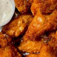 Wings (25 Pc) · 25 Crispy Chicken Wings. Your Choice of Sauce and Dip.