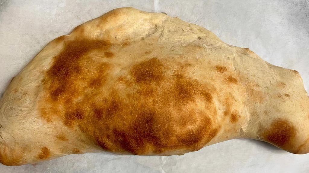 Calzone · Mozzarella Cheese and Ricotta Cheese wrapped in Pizza Dough