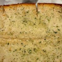 Garlic Bread Hero · Lightly Toasted Hero Bread coated with Olive Oil infused with Garlic, Parsley, and Parmesan