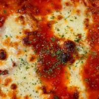 Lasagna · Layers of Lasagna-Pasta, Ground Beef, and Ricotta Baked in Marinara Sauce & Topped with Mozz...