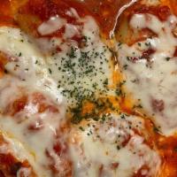 Stuffed Shells · 4 Jumbo Pasta Shells Packed with Ricotta Cheese Baked in Marinara Sauce & Topped with Mozzar...