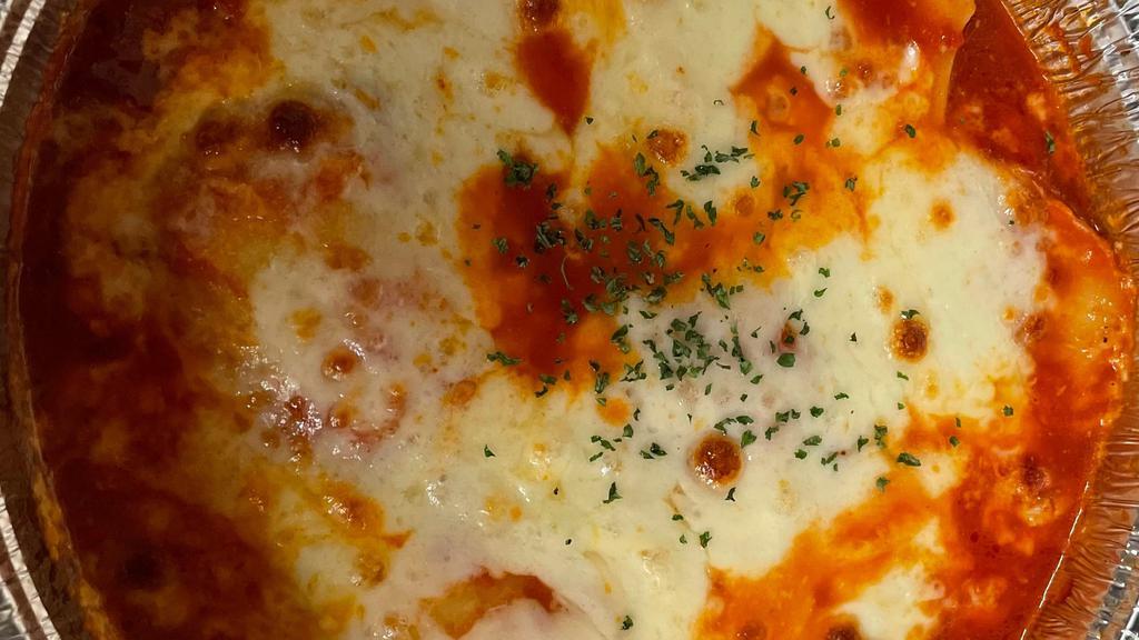 Cheese Ravioli · 6 Pieces of Ravioli (contain Ricotta Cheese) Baked in Marinara Sauce & Topped with Mozzarella Cheese