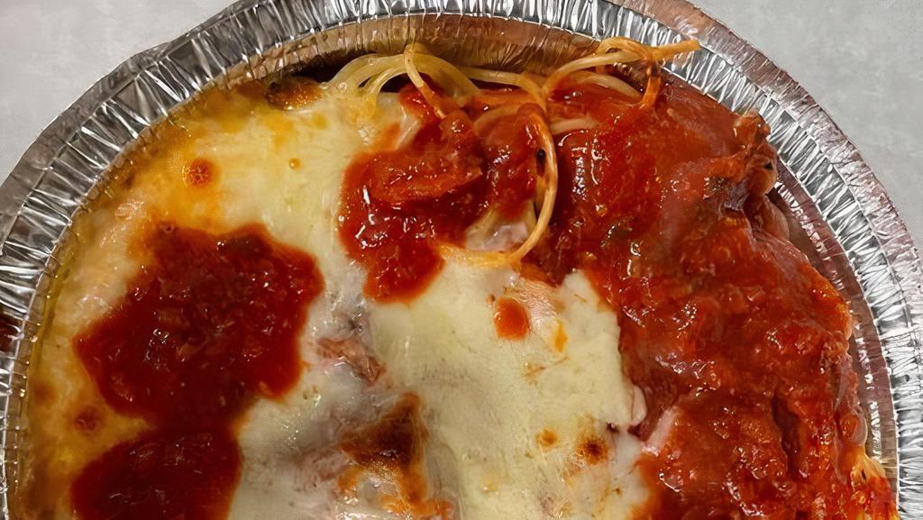 Eggplant Parmigiana W Pasta · Breaded Eggplant Cutlet Baked in Marinara Sauce & Topped with Mozzarella Cheese and Parsley alongside Your Choice of Pasta