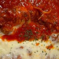 Veal Parmigiana W Pasta · Breaded Veal Cutlet Baked in Marinara Sauce & Topped with Mozzarella Cheese and Parsley alon...