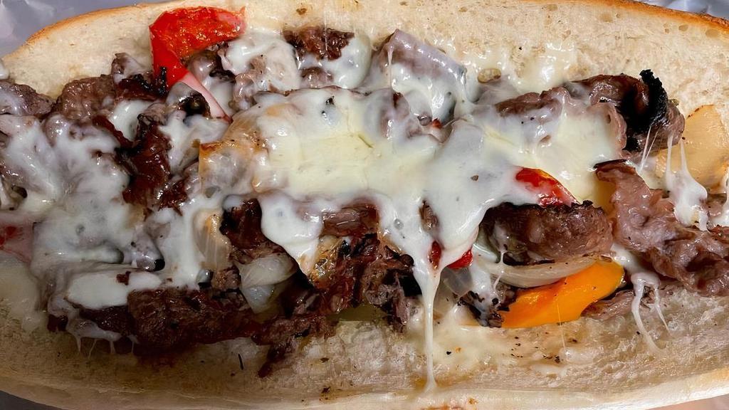 Philly Cheese Steak Hero · Shredded Steak, Onions, and Cheese. Your Choice of Cheese and Additional Toppings