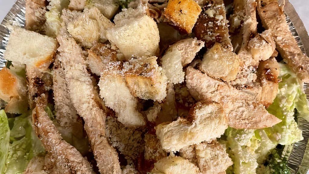 Chicken Caesar Salad · Chicken (Breaded or Grilled), Romaine, Caesar Dressing, Parmesan Cheese, and Croutons. Served w 3 Garlic Knots.