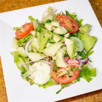 Avocado Salad · Roman lettuce, avocado, tomatoes, cucumbers, red onion, and balsamic vinaigrette.