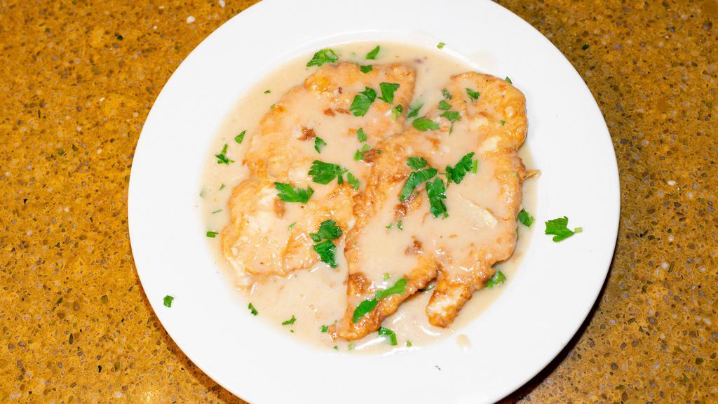 Chicken Francese · 2 breasts of chicken sautéed with white wine, butter, and lemon.