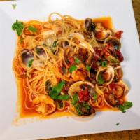 Pasta Marechiaro · With shrimps and clams in a light marinara sauce.