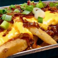 Chili Cheese Fries  · Fries absolutely overloaded with House Chili, Cheesy Sauce,  Smoked-Out Aioli, Bacon Crumble...
