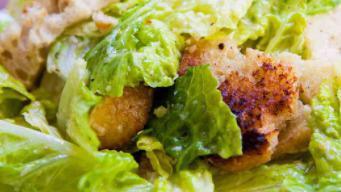 Caesar Salad · Romaine lettuce, croutons, shaved Parmesan, and Caesar dressing.