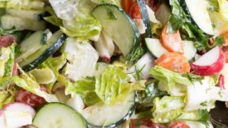 Garden Salad · Mixed greens, tomatoes, sliced cucumbers, red onions, shredded carrots, sweet peppers, slice...