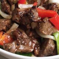Black Pepper Stir-Fry · White Onions, scallions, mix bell peppers, sautÃ©ed in a brown sauce served with 8oz side wh...