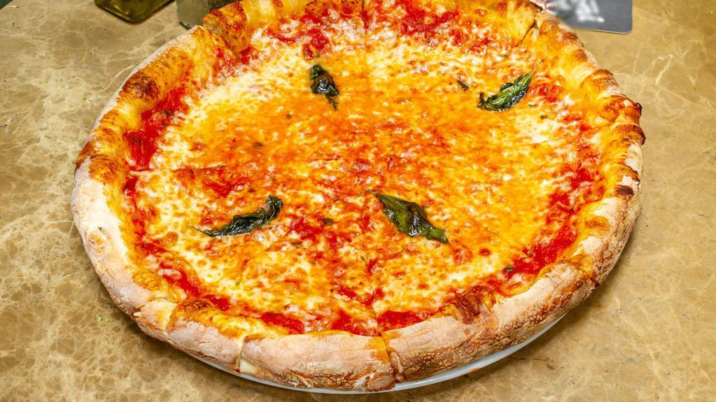Pizza Margherita · Tomato sauce, mozzarella, basil.