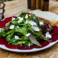 Barbabietole Con Caprino E Mesclun · Seasonal beets with goat cheese and mixed greens in a balsamic vinaigrette dressing.