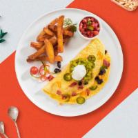 Mexican Omelette · Three Eggs, Onions, Tomatoes, Jalapenos & Cheese.
