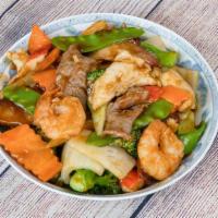 Happy Family · Jumbo shrimp, pork, chicken, beef, crab meat with mixed vegetables.