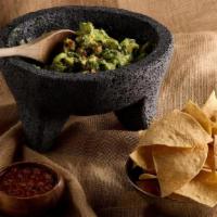 Guacamole Delivery · Made fresh to order with warm corn tortilla chips and roasted tomato salsa. Choose your spic...