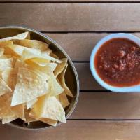 Chips & Salsa Delivery · Warm corn tortilla chips with roasted tomato salsa. Gluten-Free