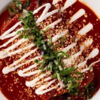 Enchiladas - Chihuahua Cheese_ · Filled with Chihuahua cheese. Choice of mole poblano, salsa verde or classic red guajillo ch...